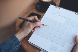 injured victim marking calendar for important personal injury case dates