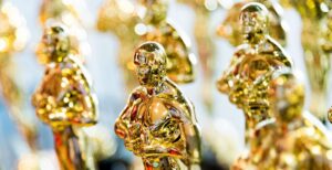 golden academy award to represent the oscars award ceremony in Los Angeles, CA that will enforce numerous street closures and may increase traffic, leading to an increase in car accidents
