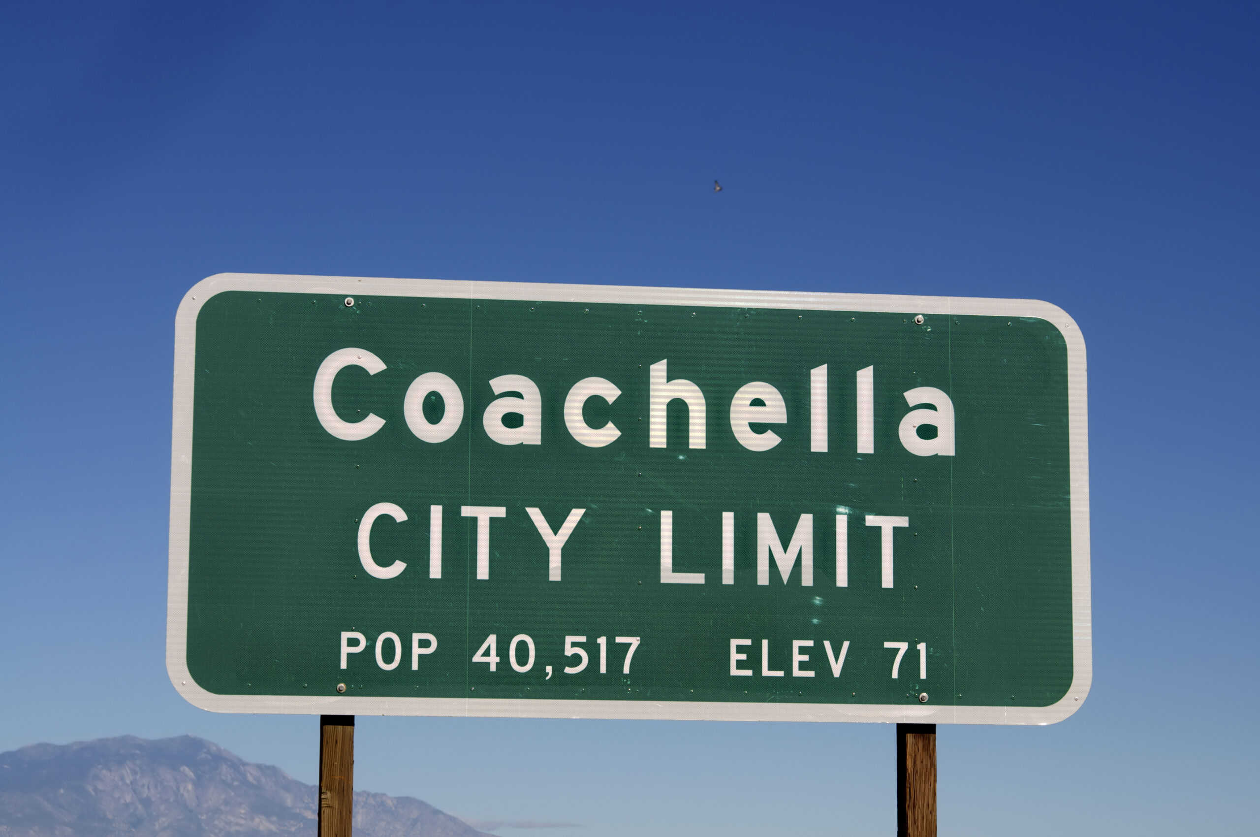 Coachella city limit sign on the California roadways for drivers and other road users