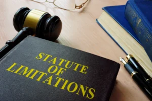 A book titled "Statute of Limitations" to represent how long an injured party has to file a personal injury lawsuit under California's statute of limitations