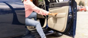 Motor vehicle passenger opening car door into a bike lane or roadway, which can lead to a dooring accident.