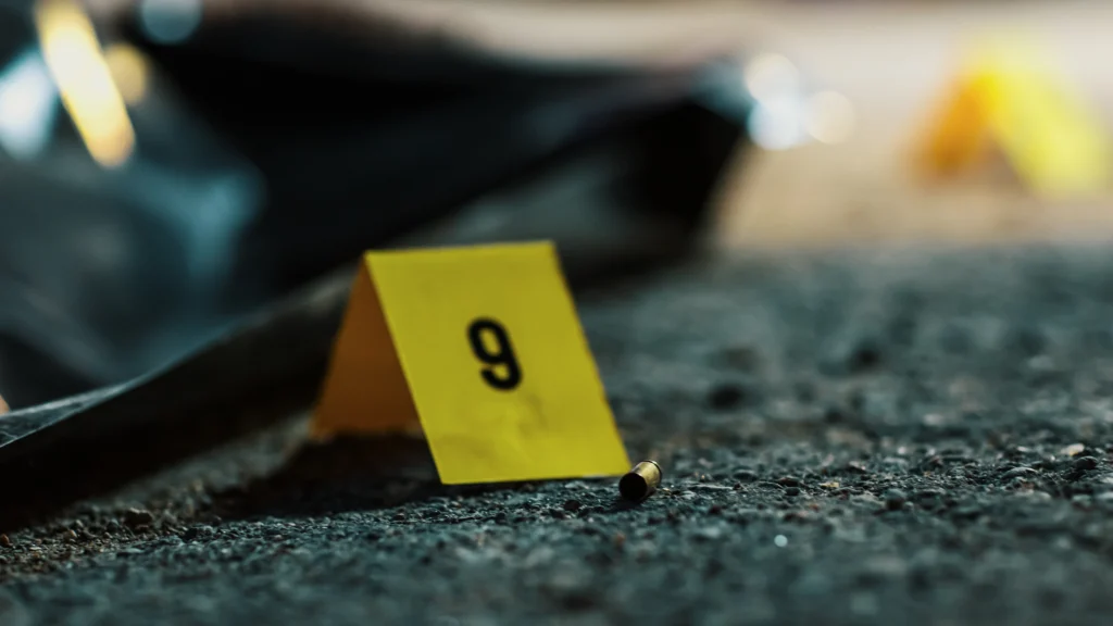 Crime scene of a shooting being investigated and evidence gathered and preserved.