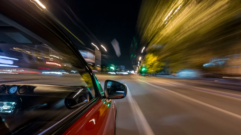 Reckless driver speeding down a roadway, which can result in a major head-on collision, hit-and-run, or rollover accident with catastrophic injuries or fatalities.